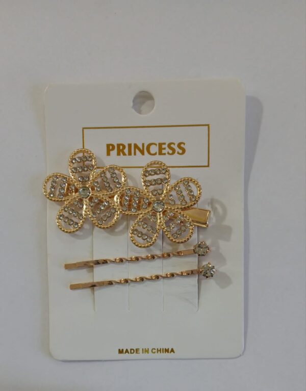 Set invisible y traba dorado con strass