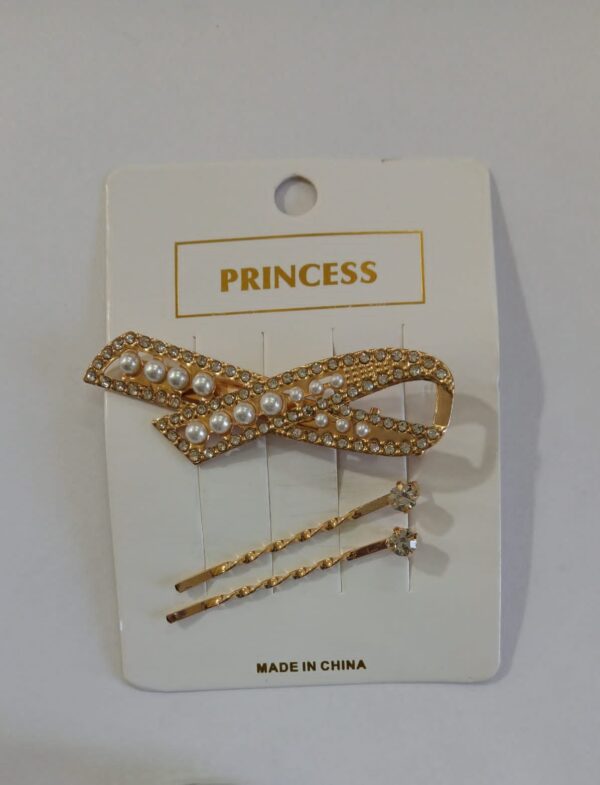 Set invisible y traba dorado con strass