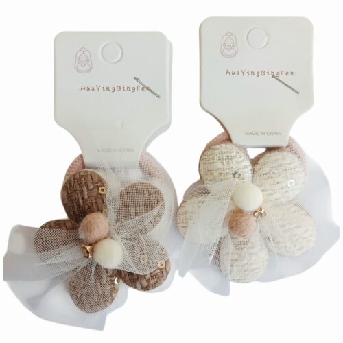 Colita con flor y apliques